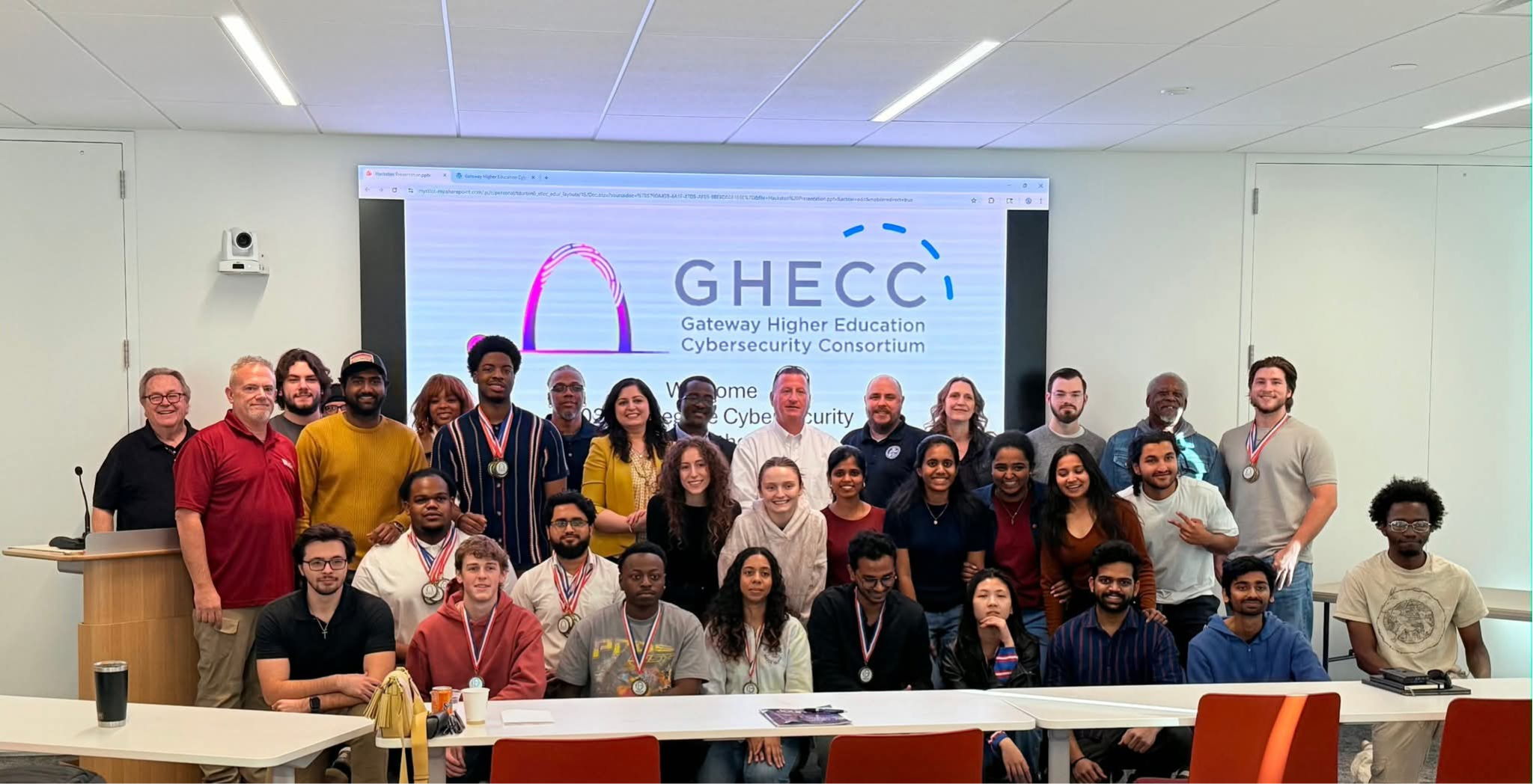 Participants and organizers at the 2025 Collegiate Cybersecurity Hackathon