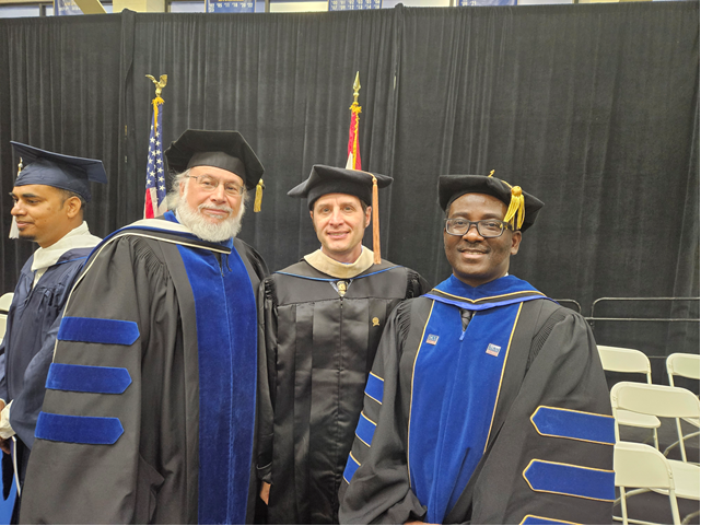 Adewale Ashogbon with academic colleagues at commencement